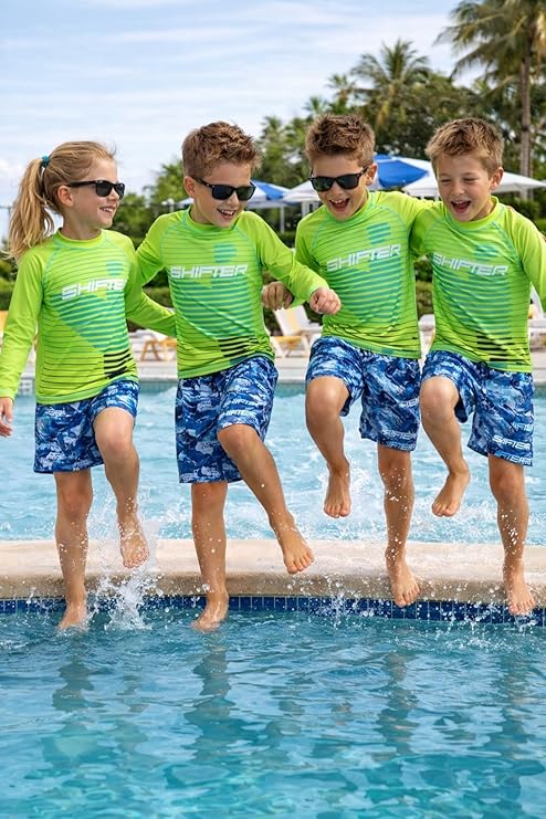 Quick dry kids swimwear for swimming pool and beach activities
Kids rash guard swimwear set with swimming goggles and cap