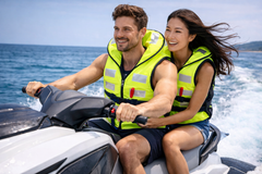 Adults wearing life jackets during river rafting adventure

High visibility life jacket used in white water rafting
