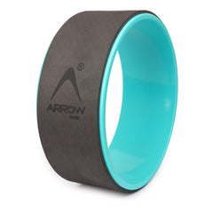 Yoga wheel with black exterior and teal interior on a white background