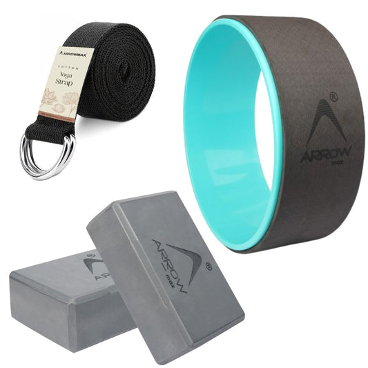 Yoga accessories set with a strap, wheel, and blocks on a white background